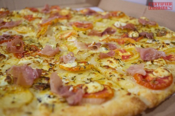 Yellow Cab Mrs Hudson's Pizza is topped with prosciutto and herbed boursin cheese[2]