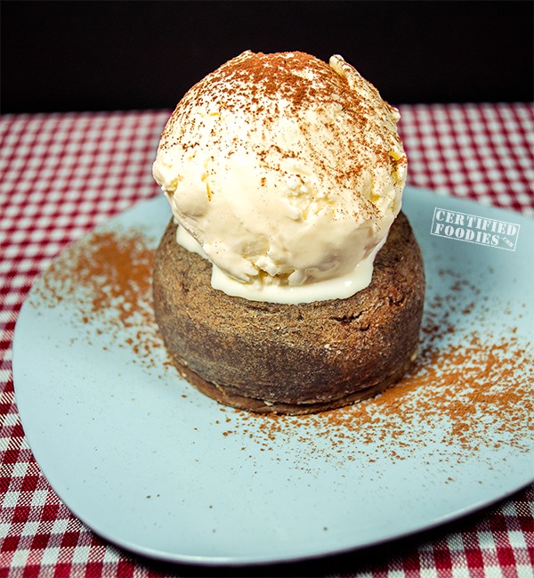 A big scoop of vanilla ice cream on top of our Molten Chocolate Cake aka Chocolate Lava Cake