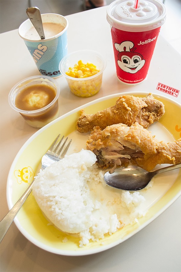 Side dishes of buttered corn and mashed potato