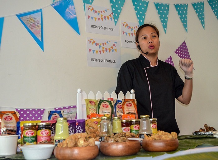 Chef Kat sharing tips on cooking and food styling for a boodle fight